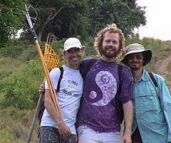 Three happy guides at Mount Victory Camp, leading a mango hunting hike.