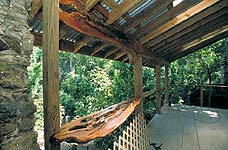 A detail of some of the woodwork in the Schoolhouse bungalow. Timbers are left with natural formations intact for a rustic but polished appearance.