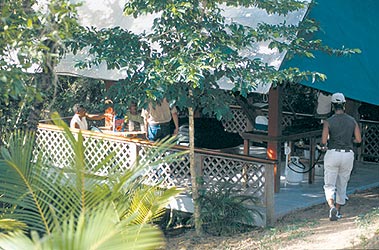 Mt. Victory campers enjoy a family gathering on the deck of the condo bungalow.